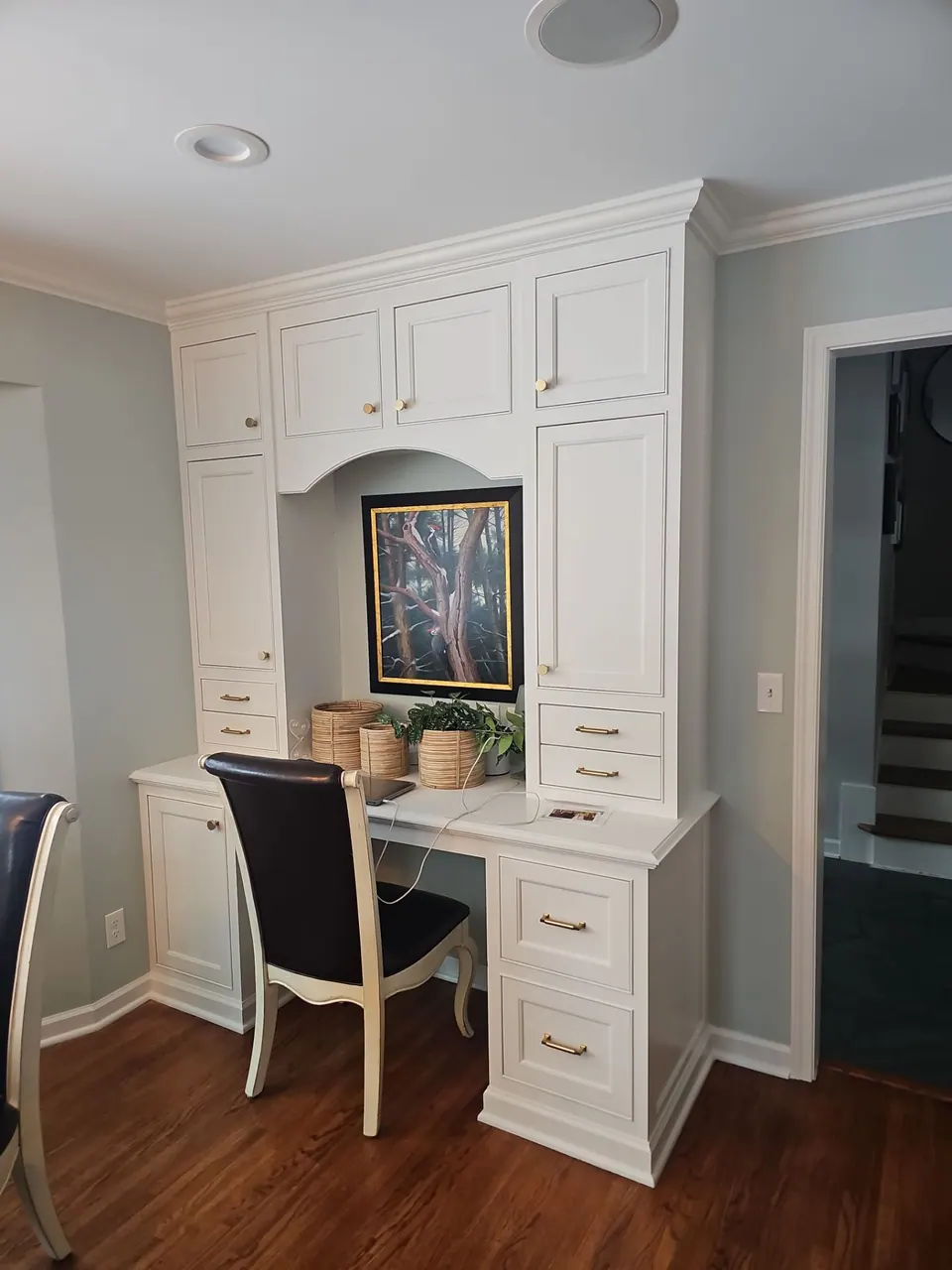 Desk nook with white painted cabinetry