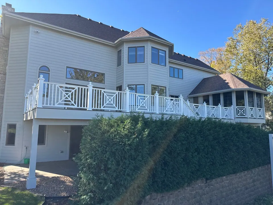 Lakeside home with painted deck railing