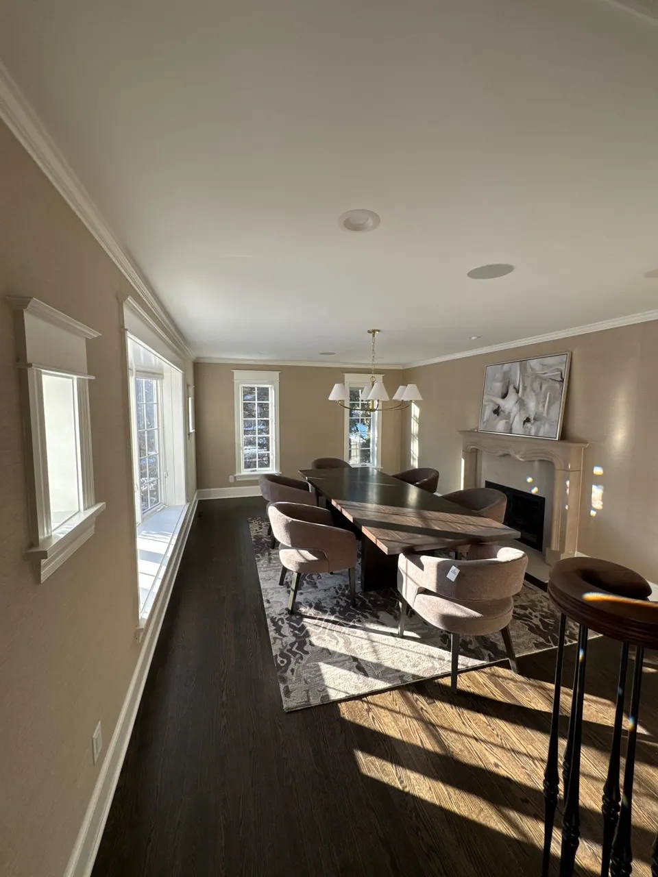 Open living room with lake view and freshly painted walls